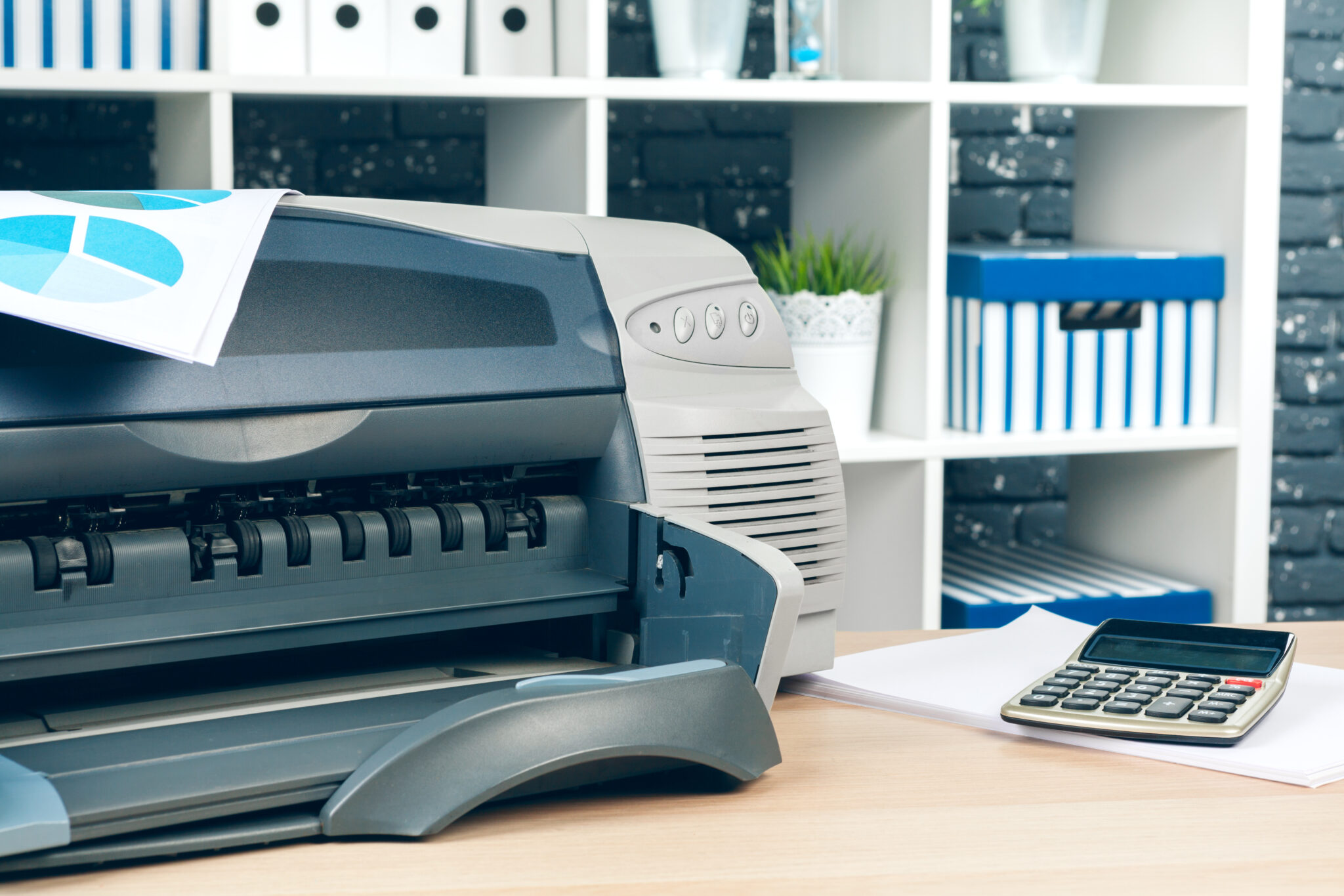 Copier or printer in a modern office interior close up